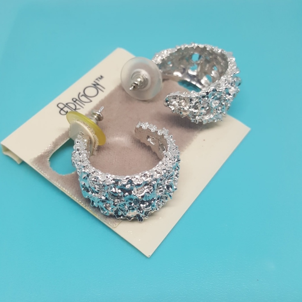 Textured silvertone half hoop earrings